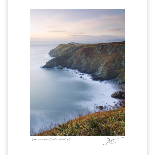 Cliffs and lighthouse at Howth Head overlooking the Irish Sea on the Dublin coast.