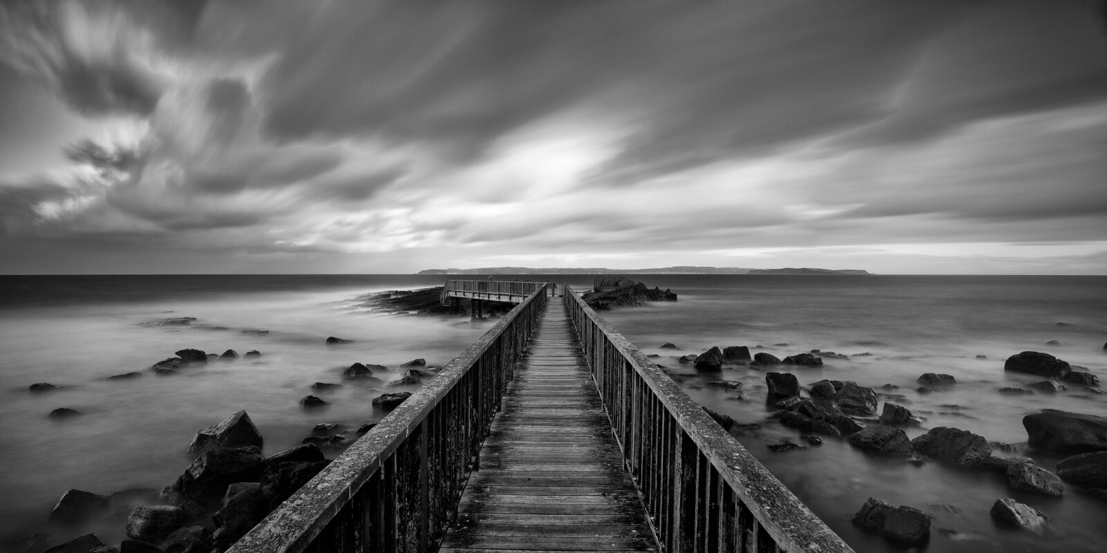 Morning's Light over Ballycastle - B&W, Clouds, Dark by .