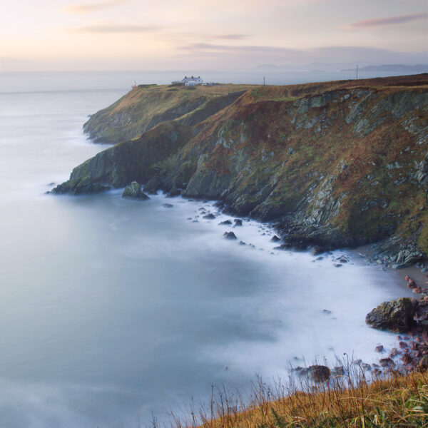 Cliffs and lighthouse at Howth Head overlooking the Irish Sea on the Dublin coast.