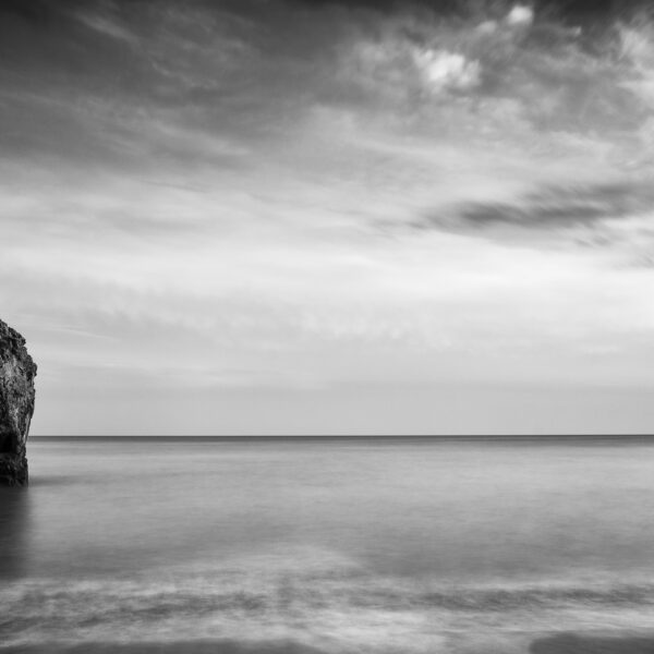 Sea stack standing offshore at Ballydowane Cove on the Copper Coast in County Waterford.