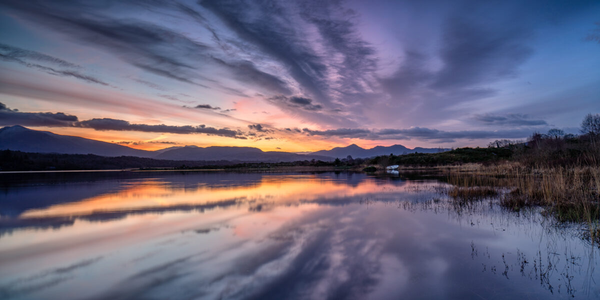 Lough Caragh at Sunrise #2 Sunrise over Lough Caragh with reflected clouds and mountains in County Kerry, Ireland.