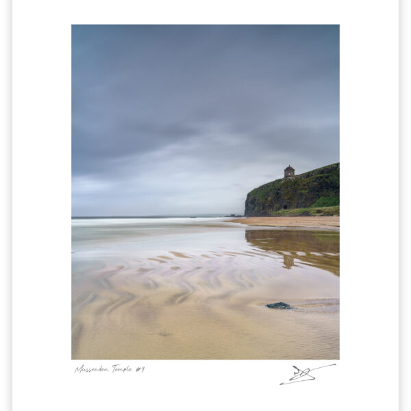 Mussenden Temple on cliffs above Downhill Strand under an overcast sky in County Derry, Northern Ireland, colour photograph.