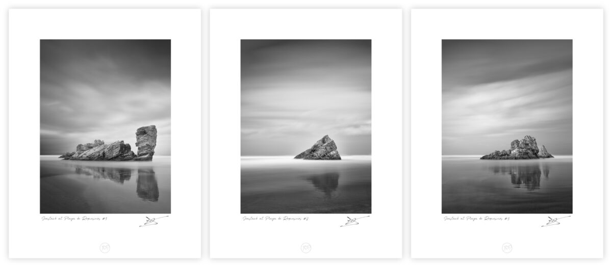 Seastack at Playa de Requesinos - Set 2 Black and white triptych of three sea stacks photographed with long exposure at Playa de Requesinos, Asturias, Spain, reflected in calm tidal water beneath a soft overcast sky.